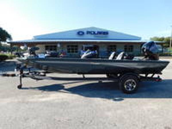 Slide: The Image of 2024 Ranger RT188 boat parked outside a dealership. - 8