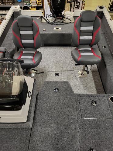 Slide: The Image of 2023 Ranger VS1682SC Angler boat interior with two seats and carpeted flooring. - 4
