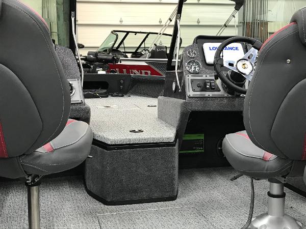 Slide: The Image of 2024 Ranger VS1782SC Angler boat interior with steering console and seating. - 10