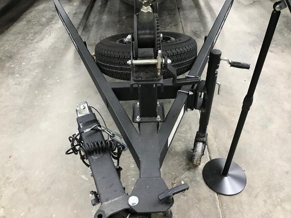 Slide: The Image of 2024 Ranger VS1782SC Angler trailer hitch and winch system in a garage. - 8