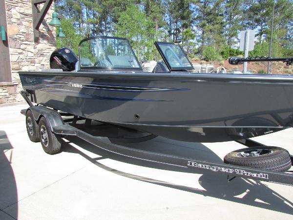 Slide: The Image of 2023 Ranger VS1882SC Angler boat on trailer, parked outdoors. - 0