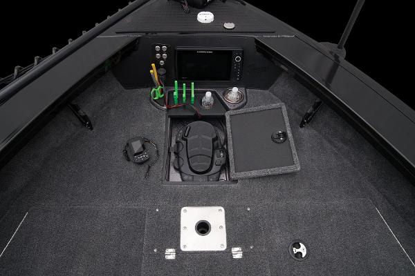 Slide: The Image of 2024 Ranger VX1888 WT boat cockpit with control panel and storage compartments. - 31