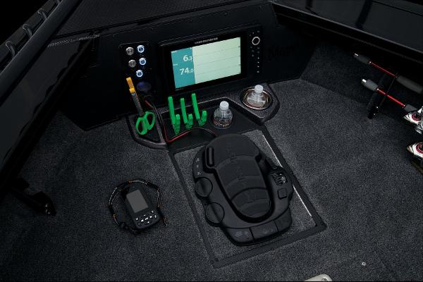 Slide: The Image of 2024 Ranger VX1888 WT boat cockpit with control panel and fishing gear. - 32