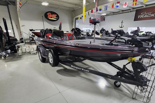 Slide: The Image of 2024 Ranger Z518 bass boat on display in showroom. - 0