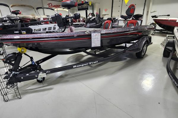 Slide: The Image of 2024 Ranger Z518 fishing boat on display in showroom. - 1