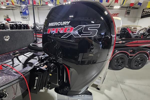 Slide: The Image of 2024 Ranger Z518 boat with Mercury Pro XS outboard motor in showroom. - 14