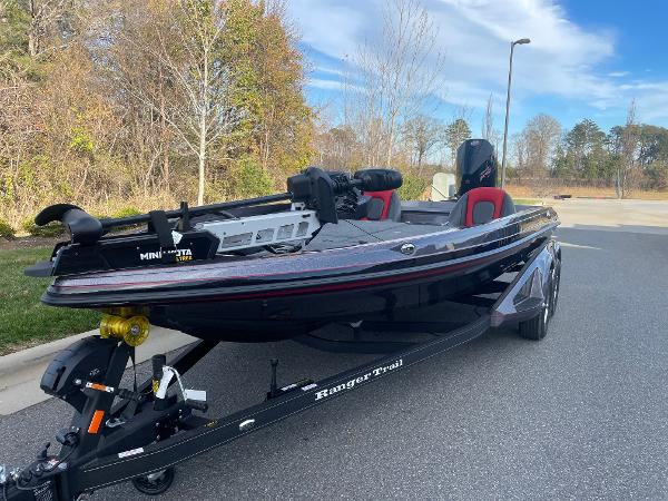 Slide: The Image of 2024 Ranger Z519 boat on trailer, parked outdoors. - 1