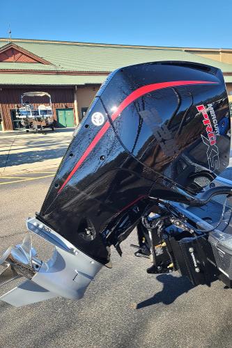 Slide: The Image of 2024 Ranger Z519 boat engine with sleek black and red design. - 10