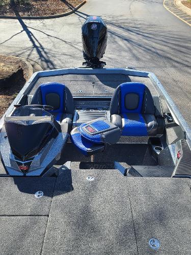 Slide: The Image of 2024 Ranger Z519 boat with blue seats and sleek design. - 5