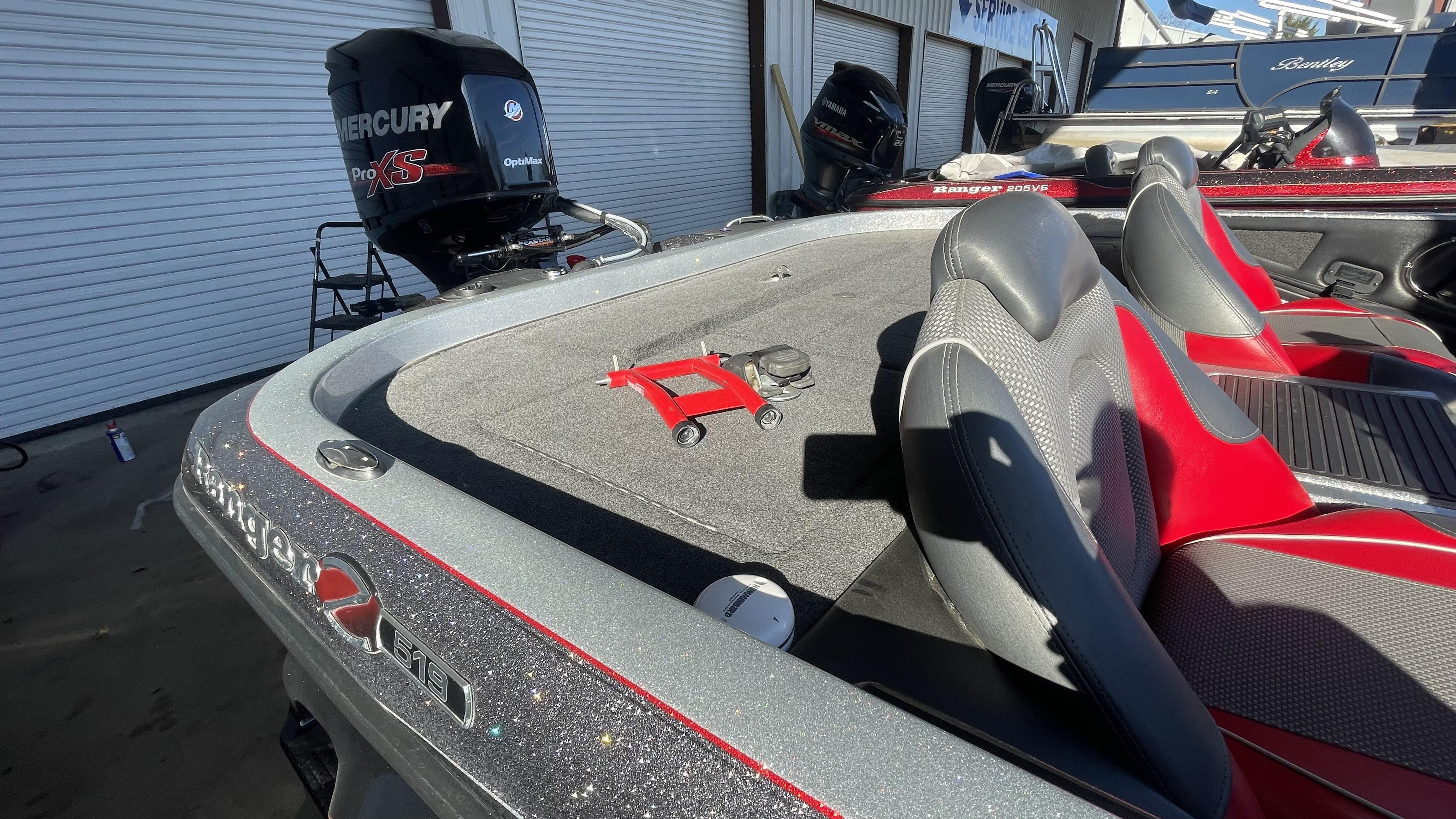 Slide: The Image of 2018 Ranger Z519C boat with Mercury Pro XS engine, red and gray interior. - 11