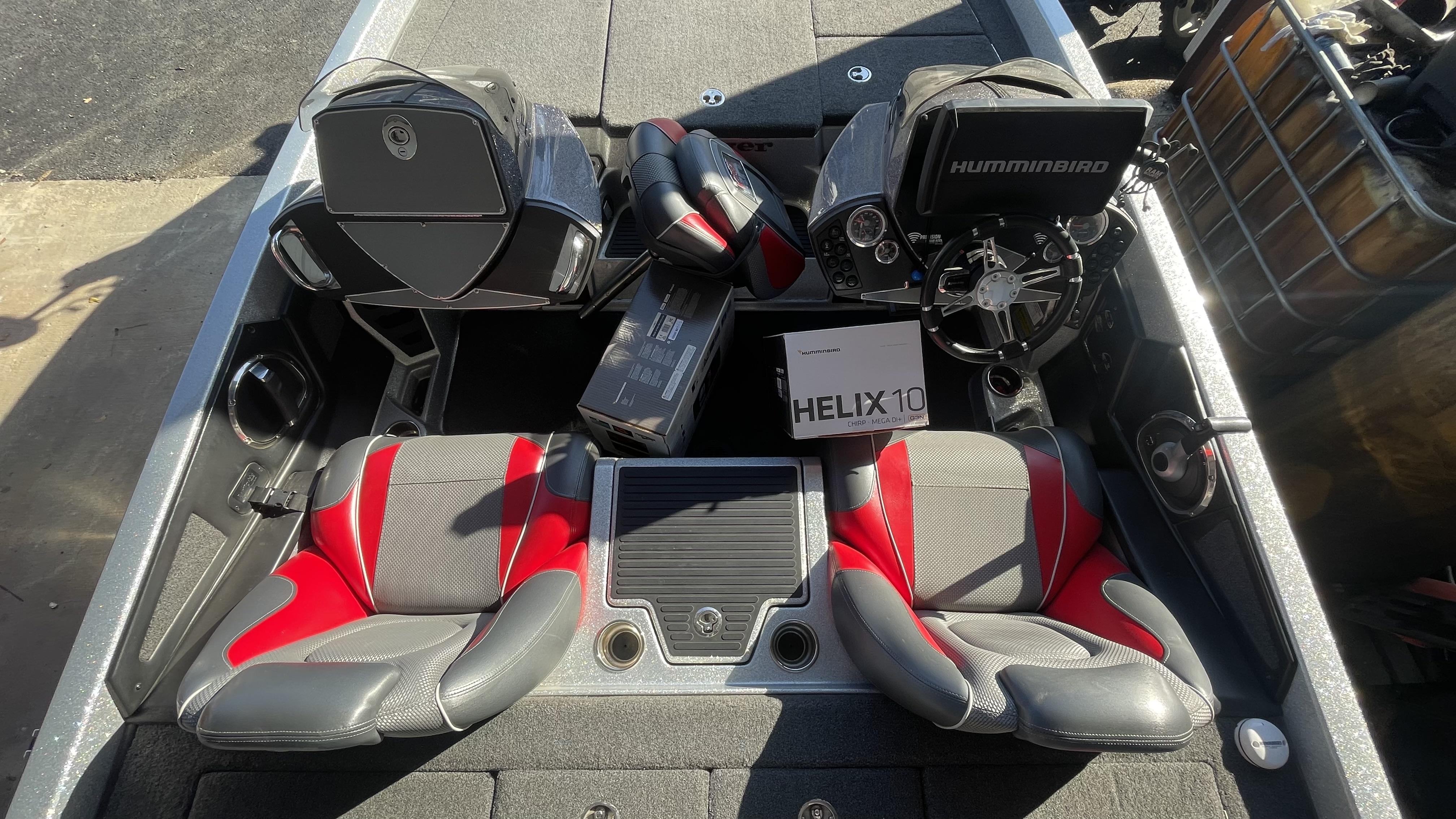 Slide: The Image of 2018 Ranger Z519C boat interior with Humminbird Helix 10 fish finder. - 12