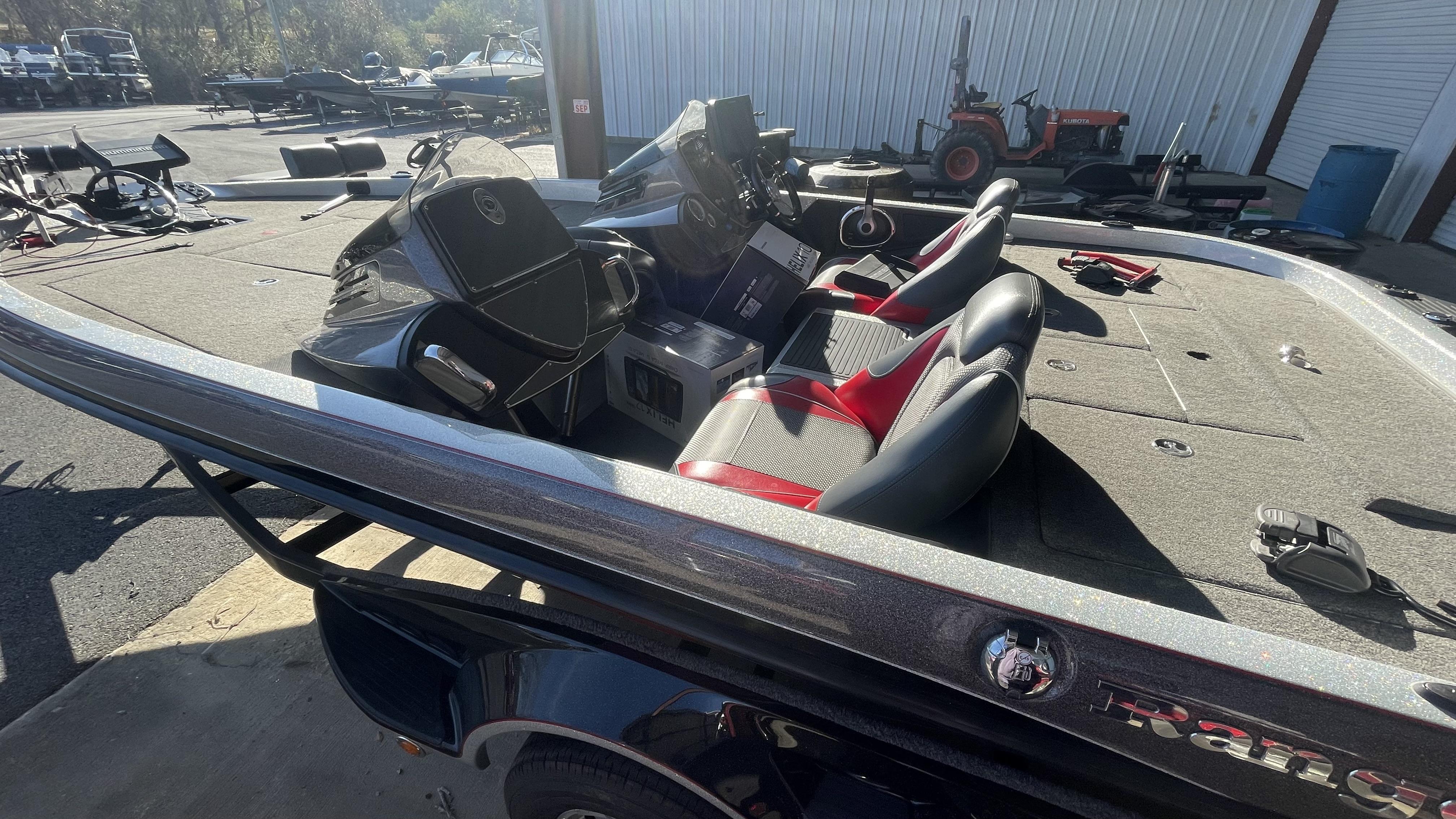 Slide: The Image of 2018 Ranger Z519C bass boat with dual seats and control console. - 19