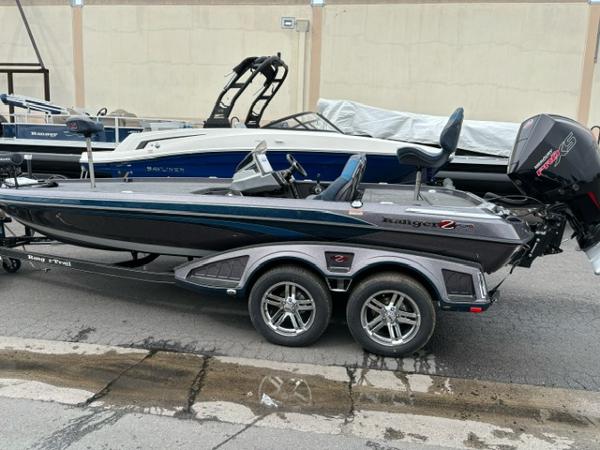 Slide: The Image of 2024 Ranger Z520R Ranger Cup Equipped boat on a trailer, side view. - 0