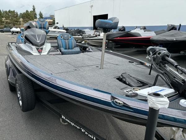 Slide: The Image of 2024 Ranger Z520R Ranger Cup Equipped bass boat in a dealership lot. - 3