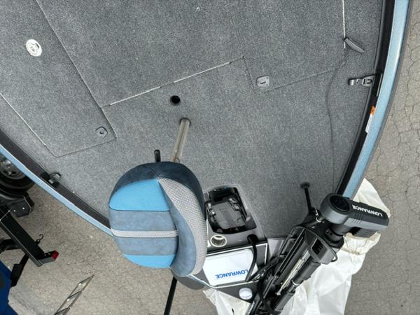 Slide: The Image of 2024 Ranger Z520R Ranger Cup Equipped boat interior with blue seat and fishing equipment. - 9