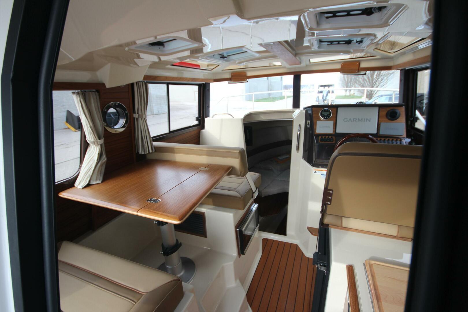 Slide: The Image of Ranger Tug R-25 Luxury Edition w/ Custom Aluminum Trailer 2023 - 5182675
