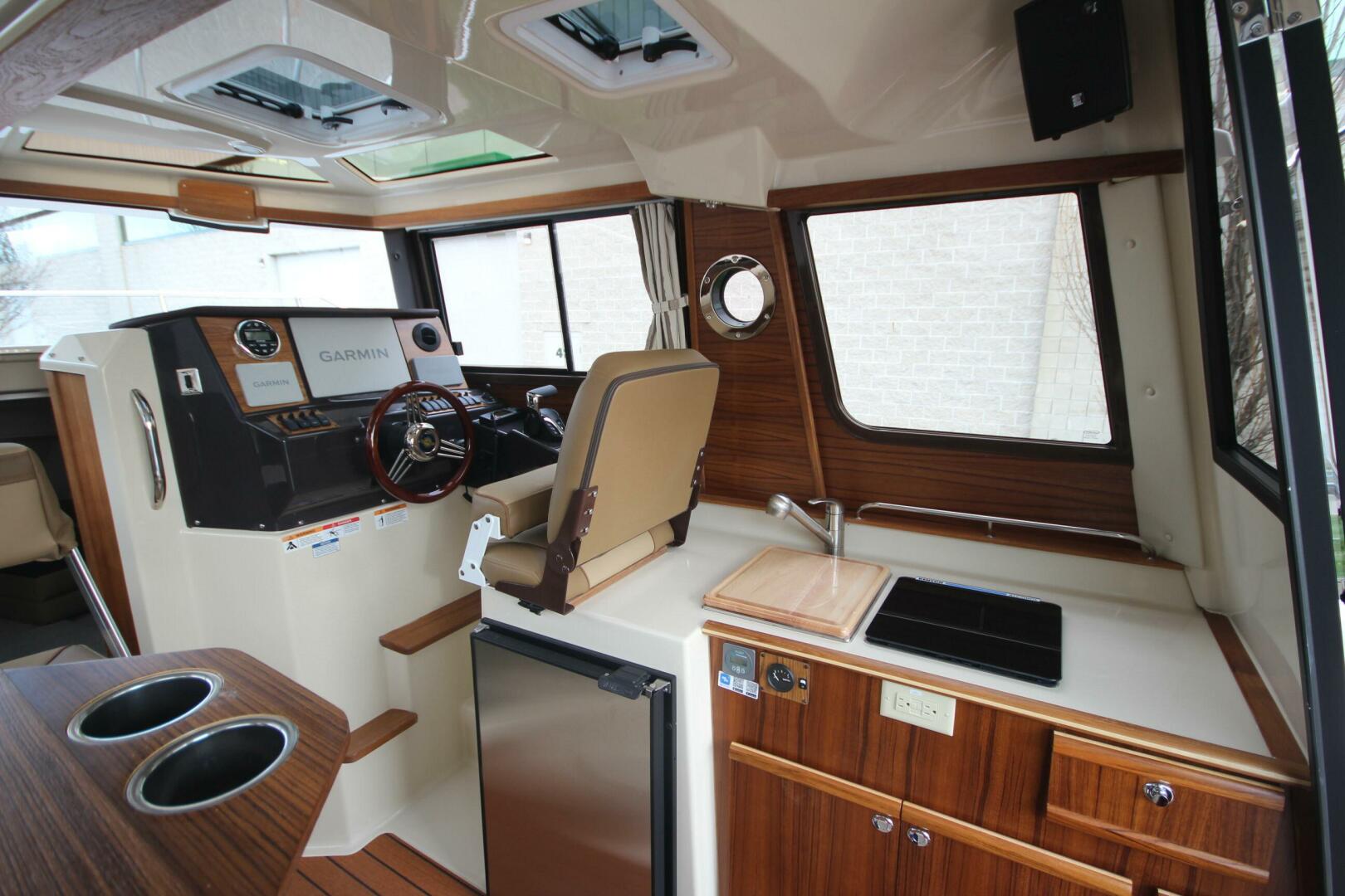 Slide: The Image of Ranger Tug R-25 Luxury Edition w/ Custom Aluminum Trailer 2023 - 5182677