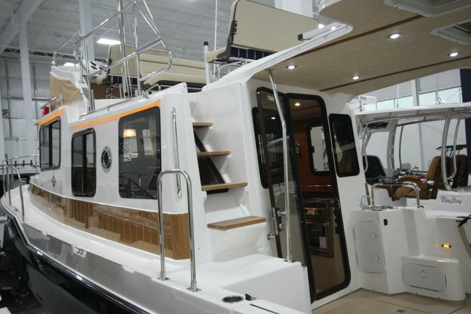 Slide: The Image of Ranger Tug R-31 Command Bridge Luxury Edition 2025 - 5157219