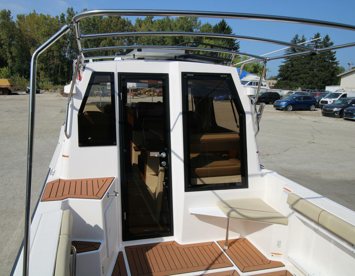 Slide: The Image of Ranger Tug R27 Luxury Edition w/ Custom Aluminum Trailer 2023 - 5181889