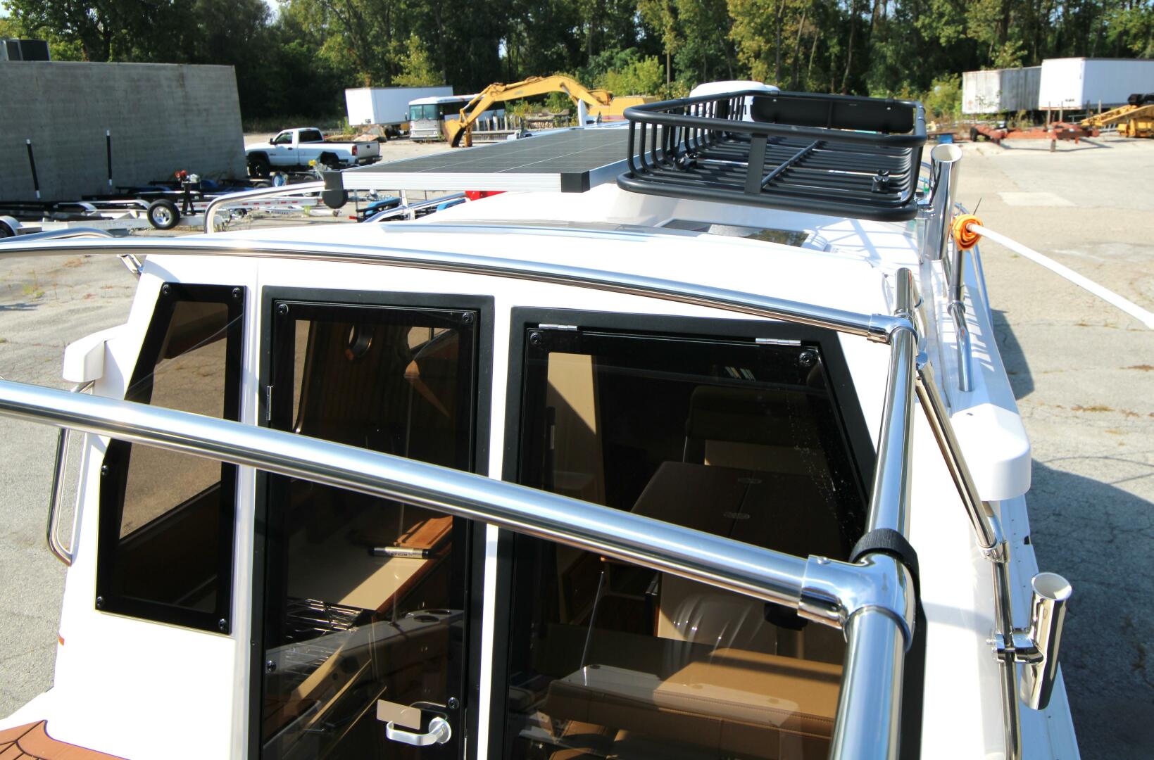 Slide: The Image of Ranger Tug R27 Luxury Edition w/ Custom Aluminum Trailer 2023 - 5181897