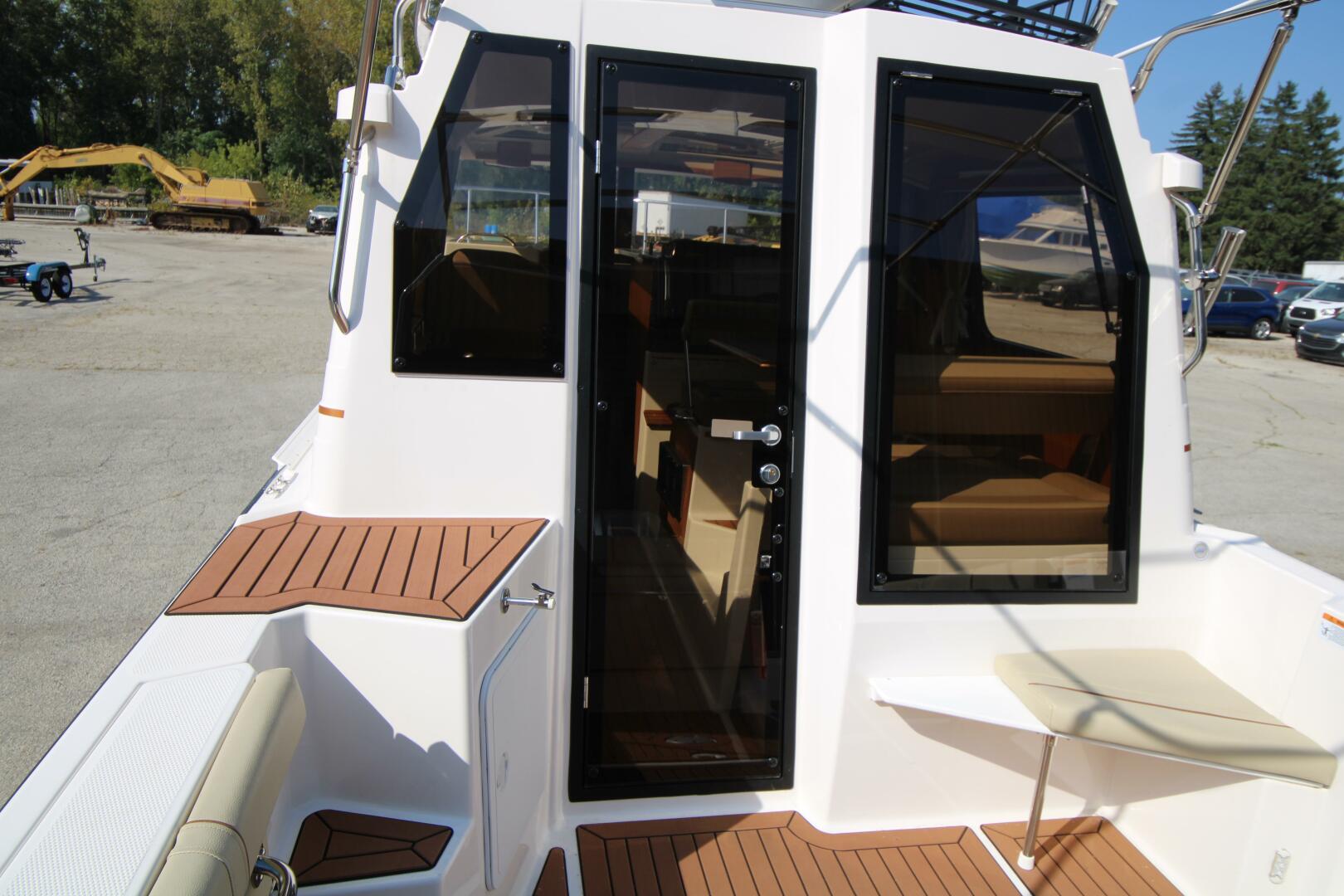 Slide: The Image of Ranger Tug R27 Luxury Edition w/ Custom Aluminum Trailer 2023 - 5181906