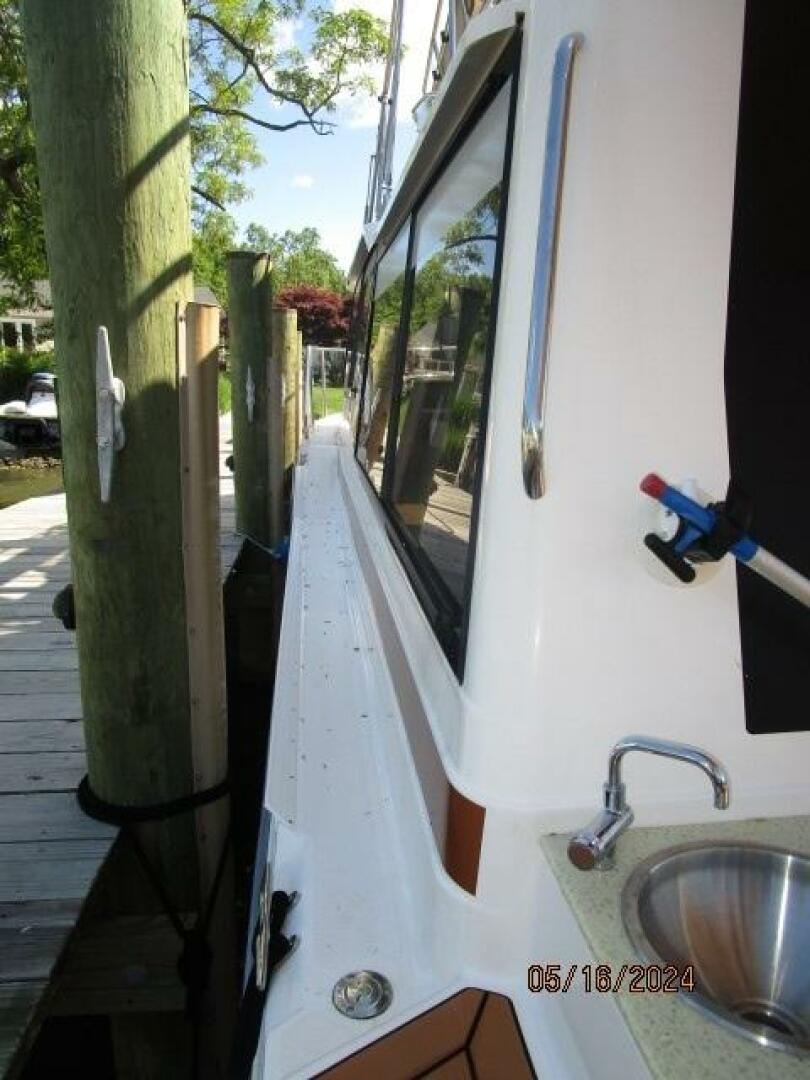 Slide: The Image of 43' Ranger Tugs port side deck2 - 4375204