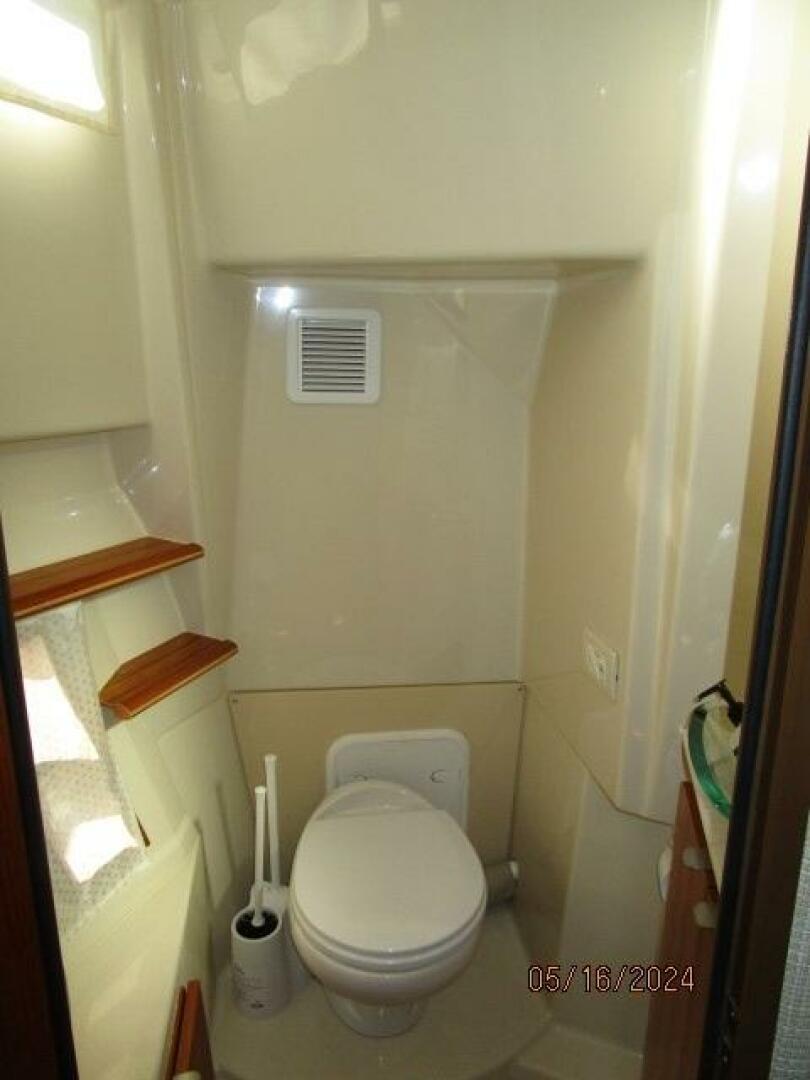Slide: The Image of 43' Ranger Tugs guest stateroom head - 4375184