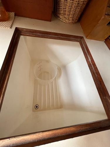 Slide: The Image of Interior storage compartment of a 1979 Ranger Yachts 30 sailboat. - 24