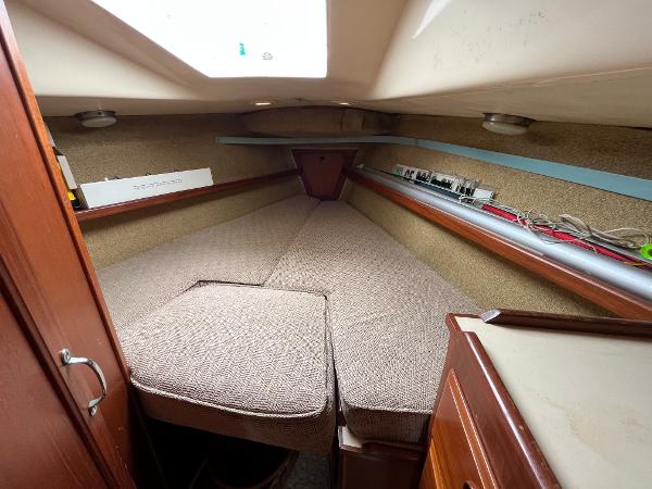Slide: The Image of 1979 Ranger Yachts 30 interior cabin with V-berth and skylight. - 29
