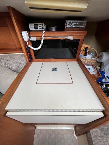 Slide: The Image of 1979 Ranger Yachts 30 interior navigation station with radio equipment. - 34