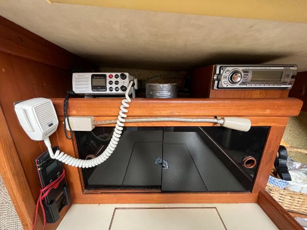 Slide: The Image of Interior electronics of a 1979 Ranger Yachts 30, featuring communication and audio equipment. - 36