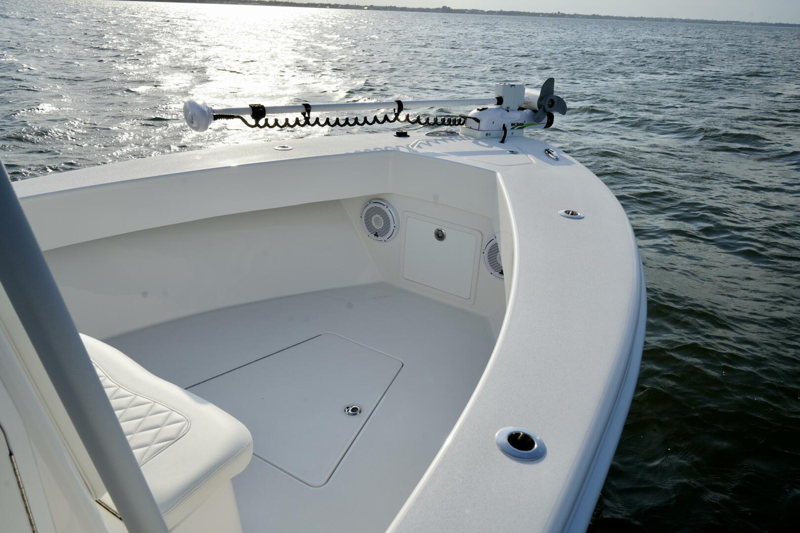 Slide: The Image of Bow with Trolling Motor 2024 Reef Runner 23 Center Console - 5205079