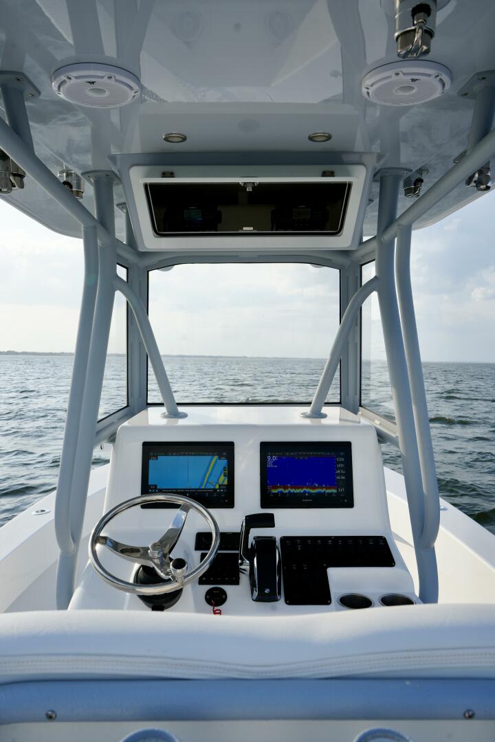 Slide: The Image of Electronics 2024 Reef Runner 23 Center Console - 5205086