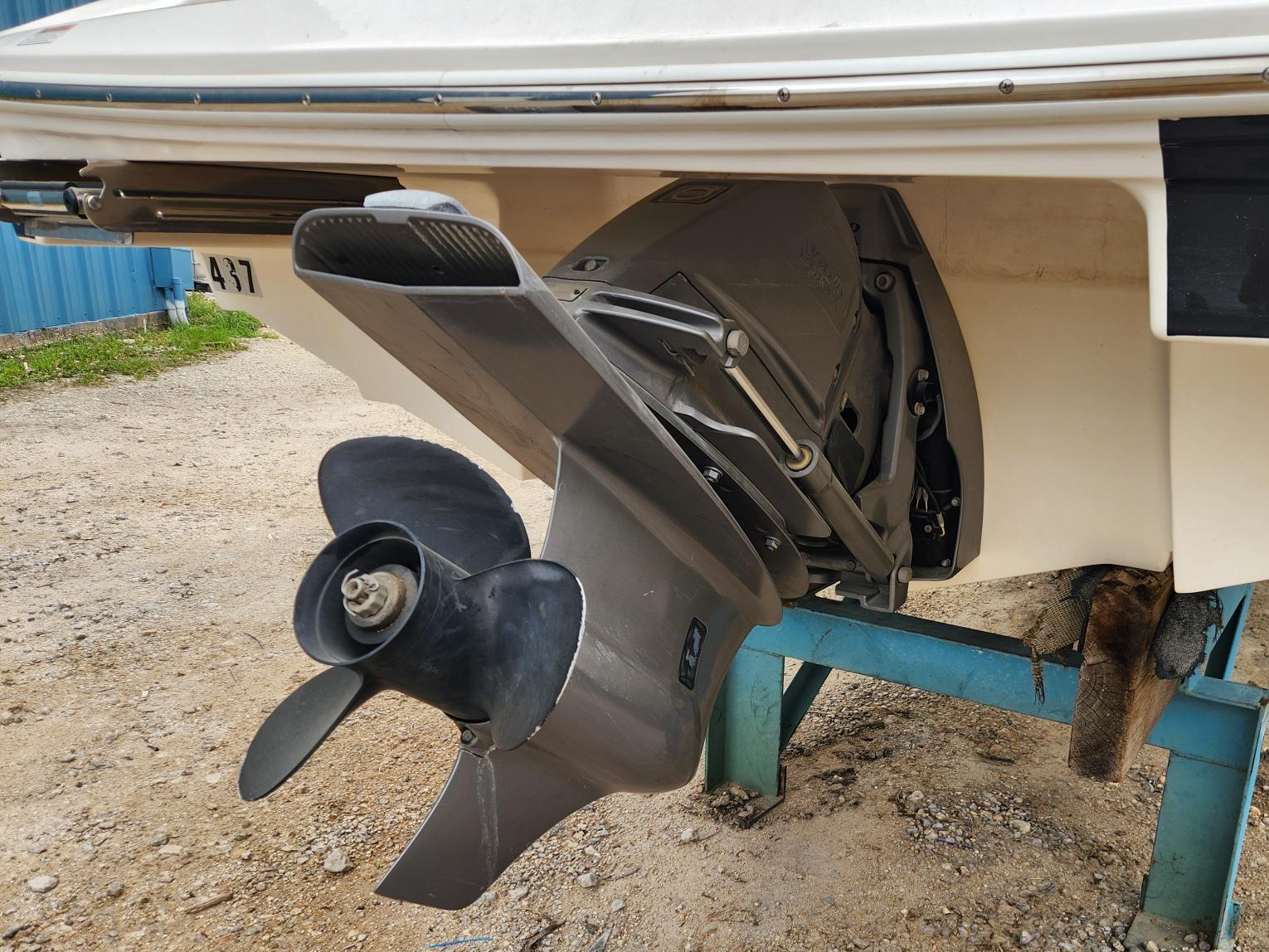 Slide: The Image of Close-up of the propeller and stern drive of a 2016 Regal 2100 Bowrider boat. - 3