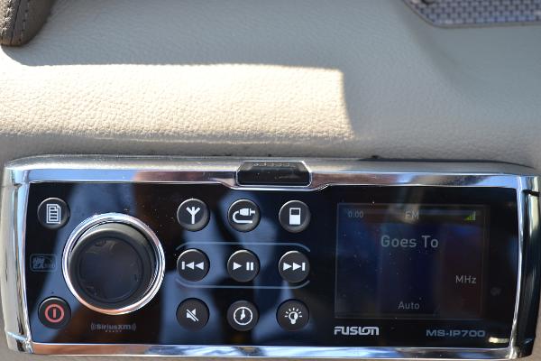 Slide: The Image of Fusion MS-IP700 stereo system on 2013 Regal 24 FasDeck boat dashboard. - 26