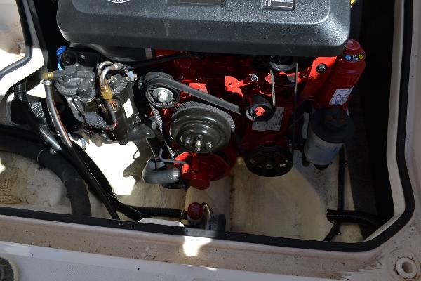 Slide: The Image of Engine compartment of 2013 Regal 24 FasDeck boat, showcasing mechanical components. - 30