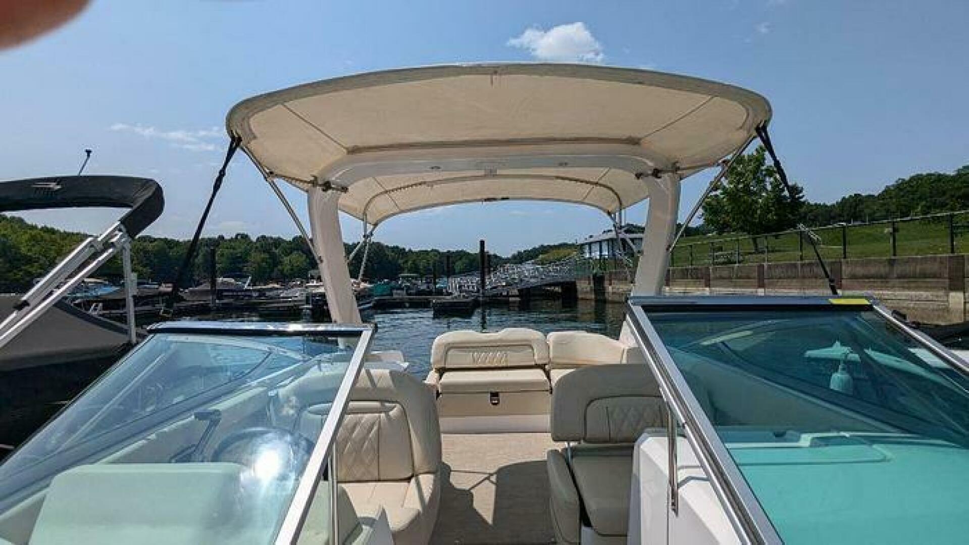 Slide: The Image of Bimini Top on the 2018 Regal 26 FasDeck 2018 Regal 26 FasDeck Bimini Top and Radar Arch  - 5234437