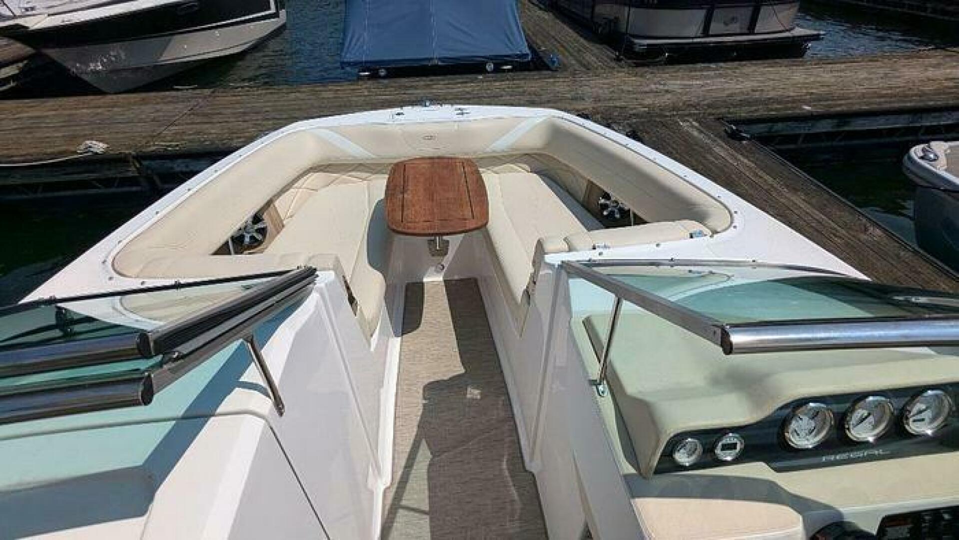 Slide: The Image of Bow View  2018 Regal 26 FasDeck Bow View , seating, and table  - 5234439