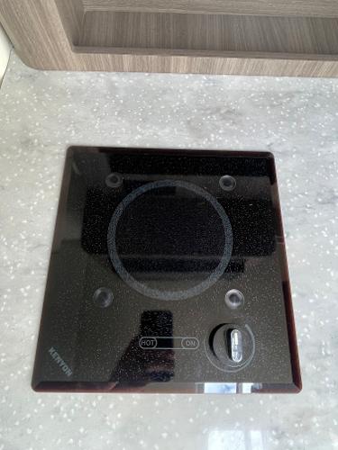Slide: The Image of Glass cooktop on a Regal 26 Express 2021 boat's countertop. - 18