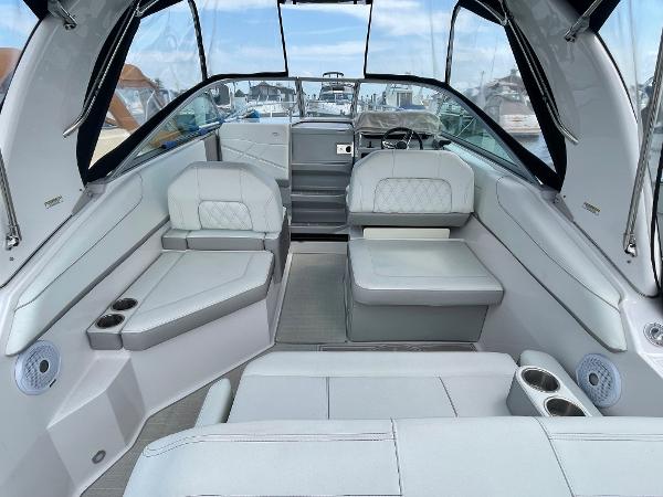 Slide: The Image of 2021 Regal 26 Express boat interior with spacious seating and modern design. - 3