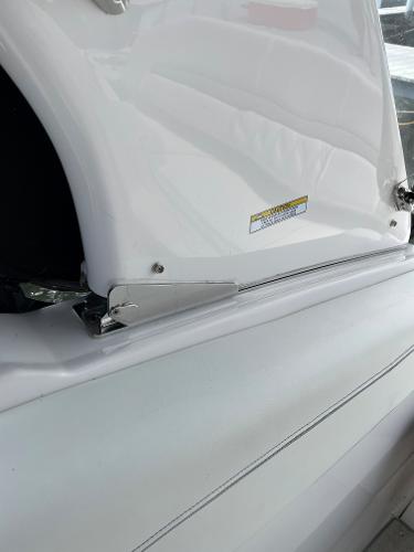 Slide: The Image of 2021 Regal 26 Express boat detail, showcasing sleek white exterior design. - 32