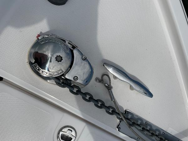 Slide: The Image of Anchor windlass and cleat on 2021 Regal 26 Express boat deck. - 35