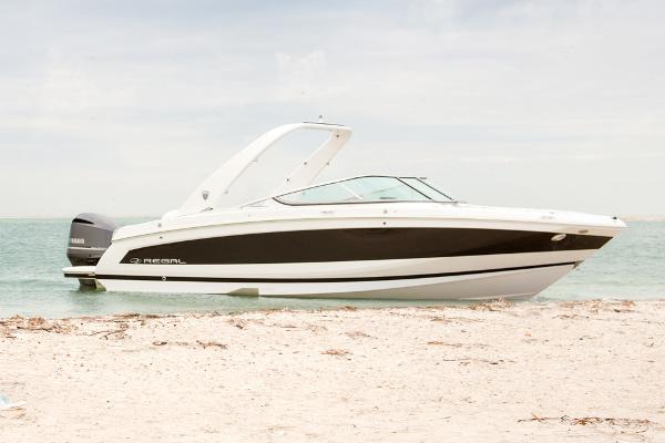 Slide: The Image of Manufacturer Provided Image: 2018 Regal 26 OBX boat on sandy beach with calm sea background. - 9