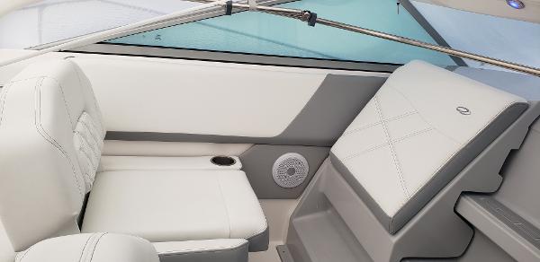 Slide: The Image of 2025 Regal 26 XO boat interior with white seating and modern design. - 2