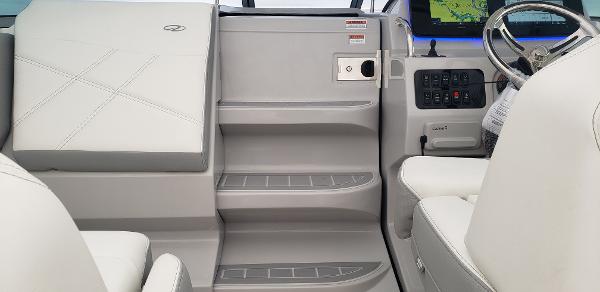 Slide: The Image of 2025 Regal 26 XO boat interior with modern dashboard and seating. - 9