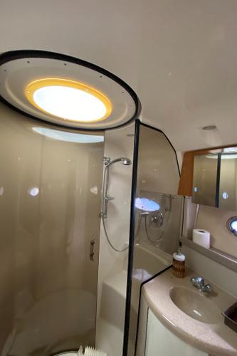 Slide: The Image of Bathroom interior of 2004 Regal 3860 Commodore yacht with shower and sink. - 28