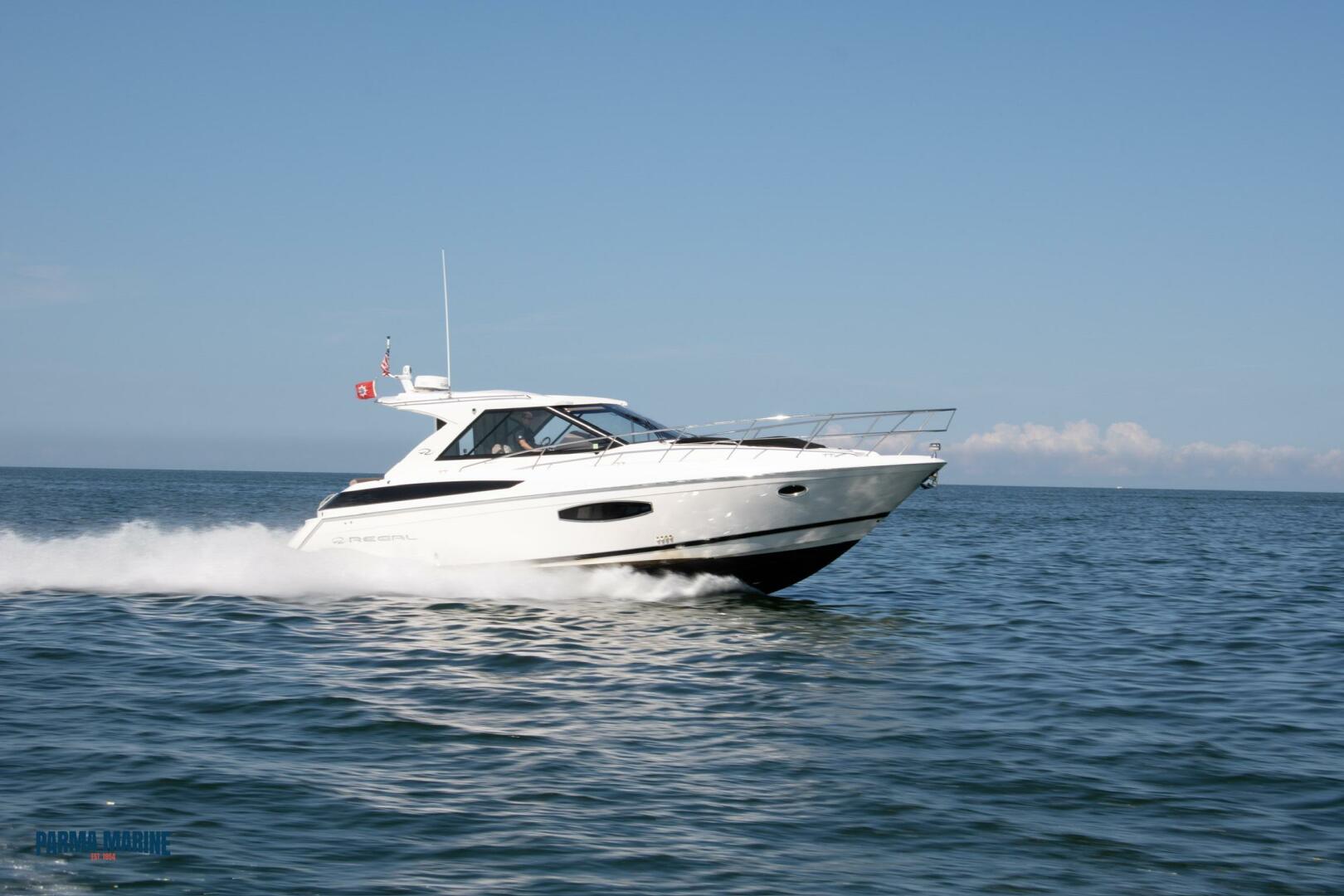Slide: The Image of Starboard Side of the 2016 Regal 42 Sport Coupe 2016 Regal 42 Sport Coupe Starboard side running shot on Lake Erie - 5131635