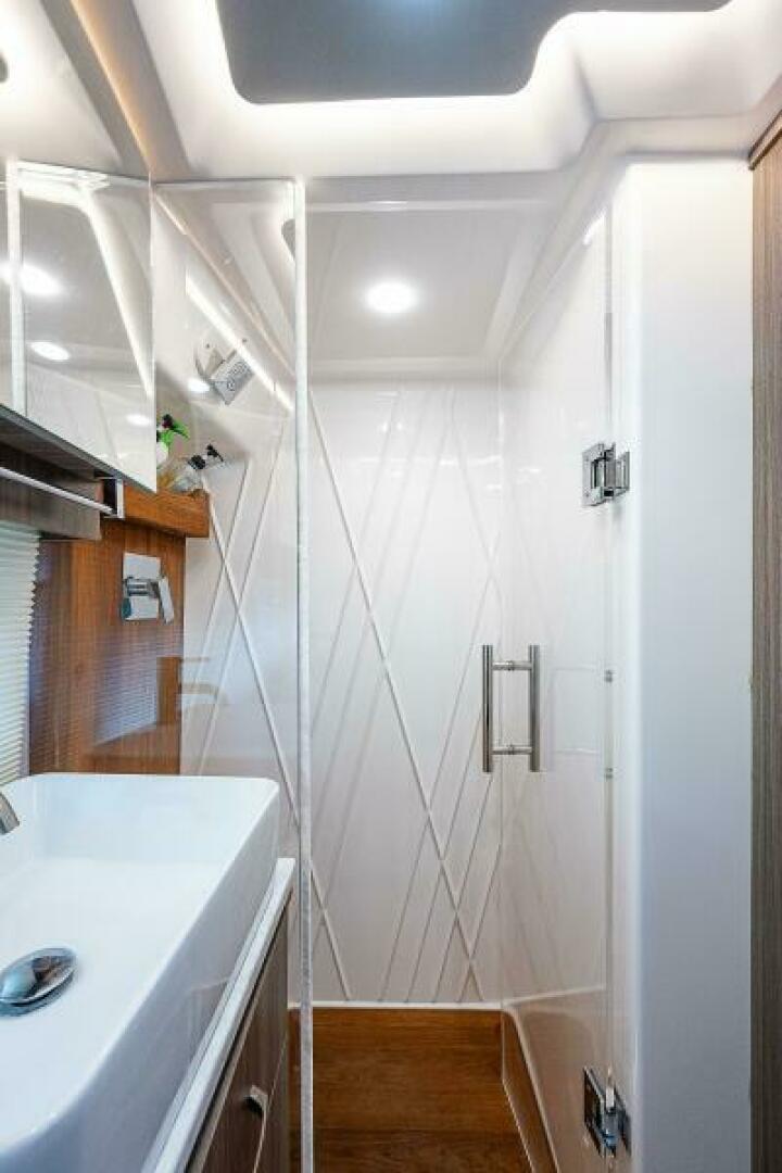 Slide: The Image of Regal 42 - Carchi - Forward Stateroom Head 2022 Regal 42 XO - Carchi - 5331385