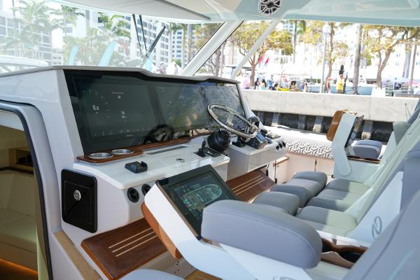 Slide: The Image of Interior cockpit of 2025 Regal 50 SAV yacht with modern navigation systems. - 13