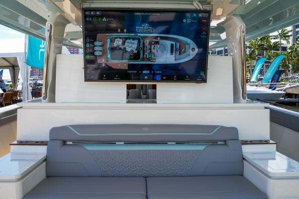 Slide: The Image of Luxury interior of 2025 Regal 50 SAV yacht with advanced navigation display. - 20